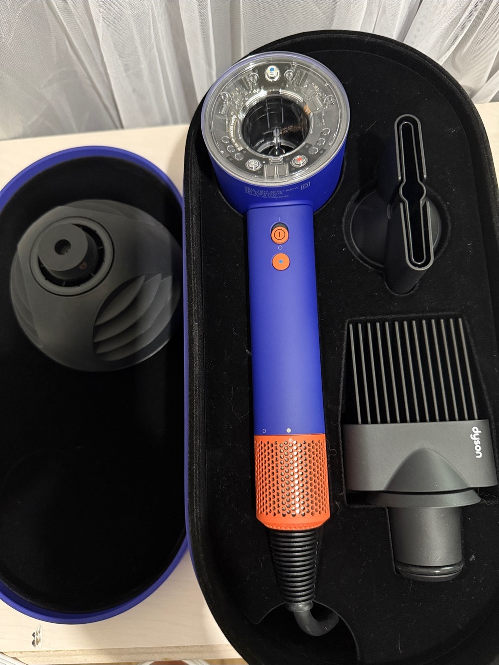 Dyson Supersonic Hair Dryer in Blue with Copper Accents and Black Attachments